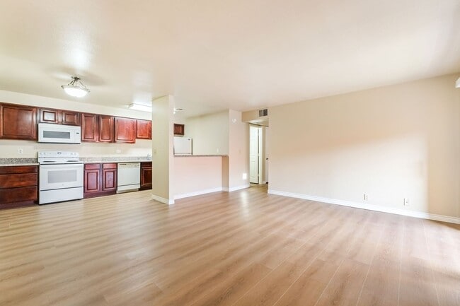 Building Photo - Bright & Charming Condo with Hardwood Floors and Included Appliances!