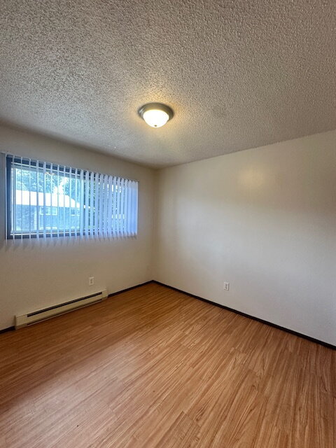 Building Photo - 2-Bedroom Apartment, Upstairs, Near Transp...