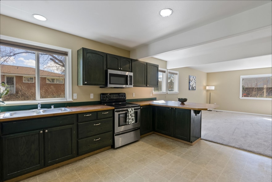 Main floor kitchen - 3519 E 25th Ave