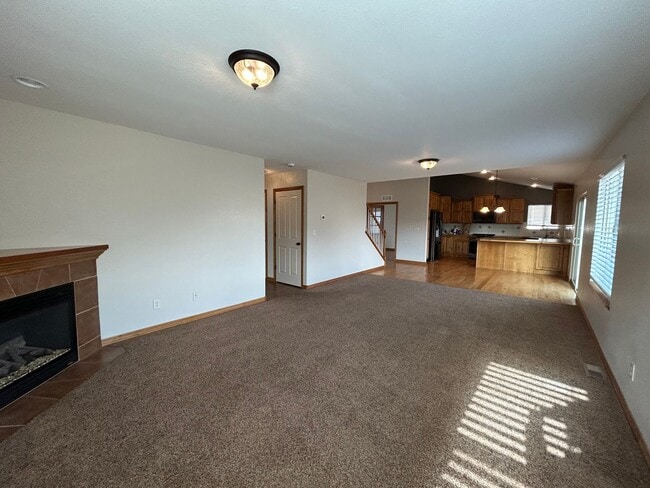 Building Photo - Spacious 5-Bedroom Home with Finished Basement and 3-Car Garage in Wellington