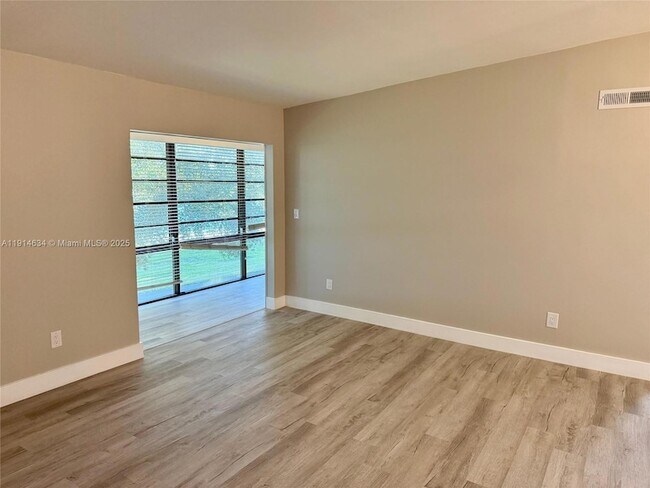 Building Photo - 9719 Hammocks Blvd