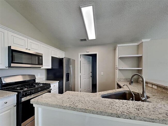 Building Photo - 7323 R J Cove Ct