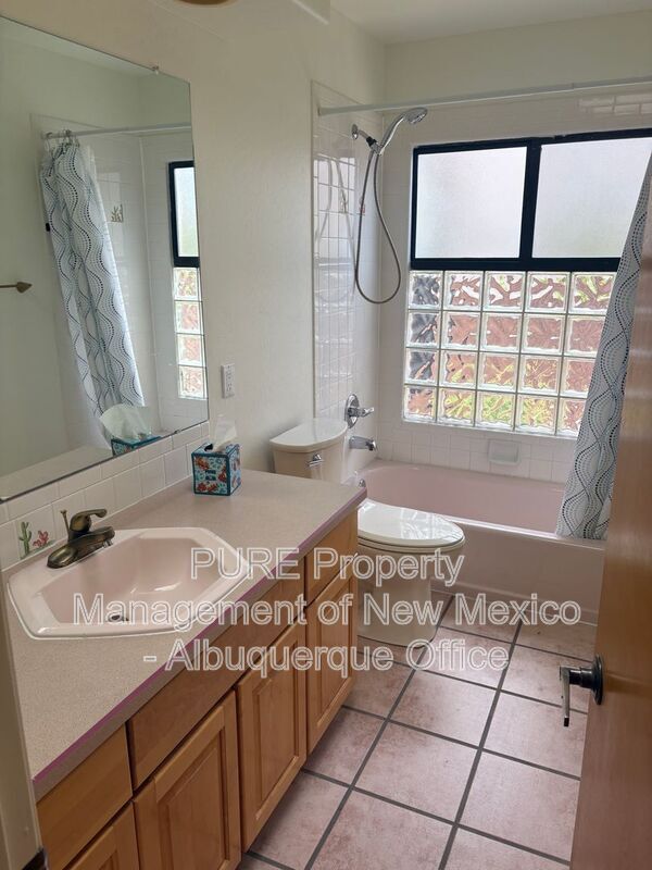 Building Photo - 8220 W Raintree Dr NE