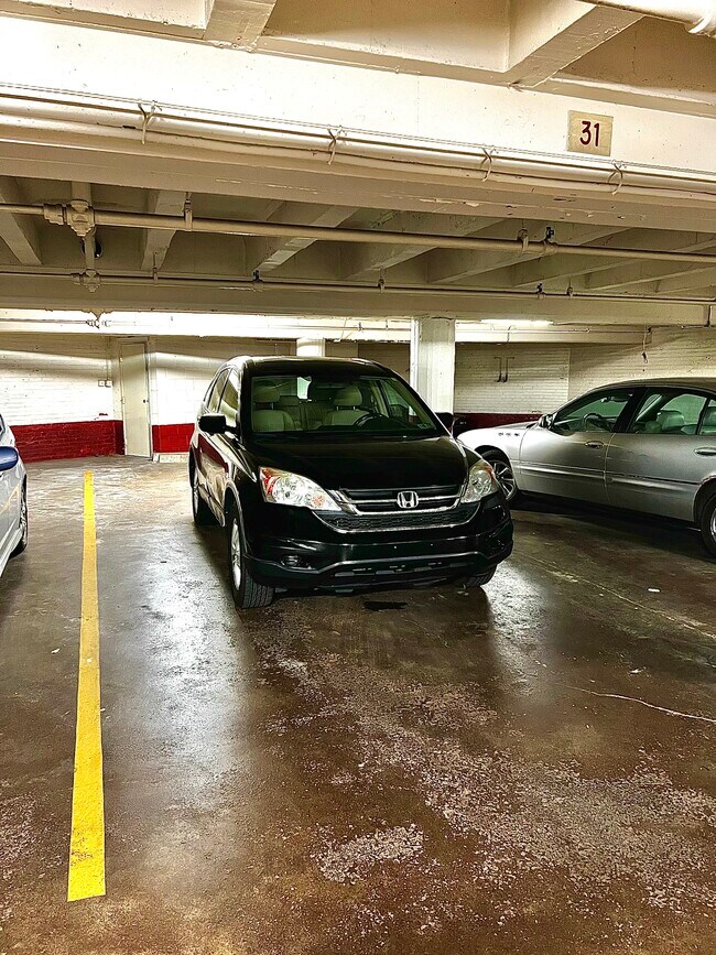 Tandem parking spot fits two cars and a motorcycle - 2500 Q St NW