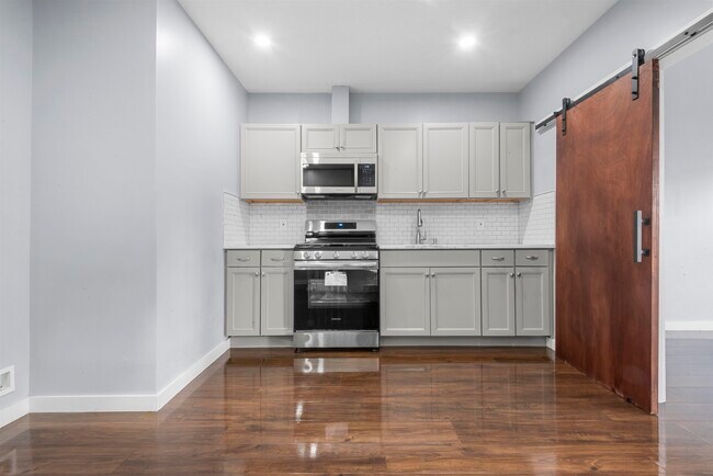 Building Photo - 161 Van Horne St