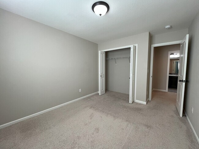 Building Photo - Spacious 4-Bedroom + Bonus Room with Modern Kitchen, Solar Panels & Private Fenced Backyard!