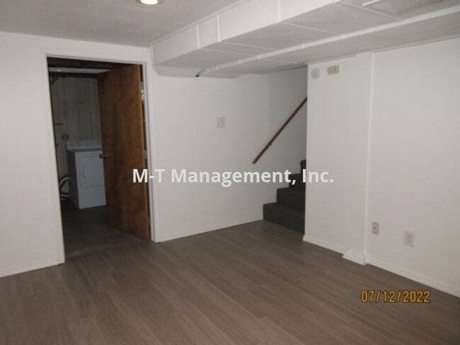 Building Photo - 3 br/1 bath north side house + 2 car garage
