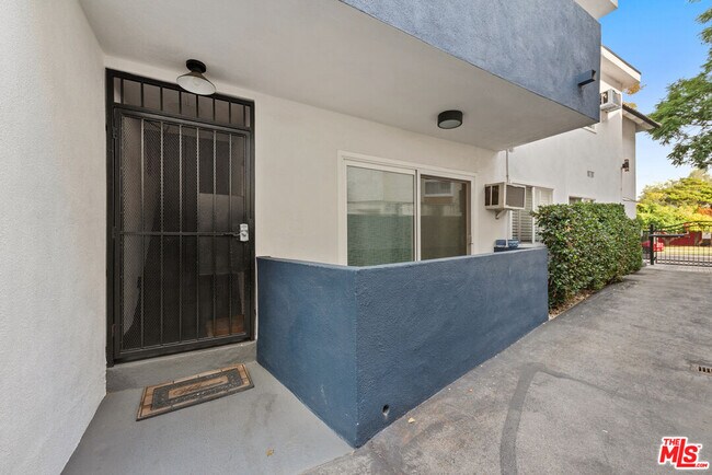 Building Photo - 3707 S Canfield Ave