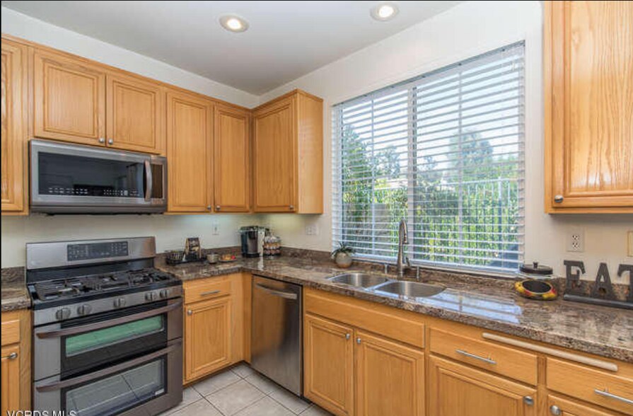 Before cabinets painted - 530 Bannister Way