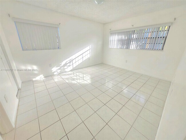 Building Photo - 18875 NW 62nd Ave