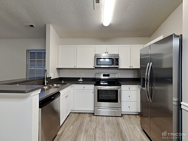 Building Photo - 12219 Stewarts Crossing Dr