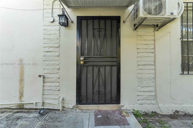 Building Photo - 6940 NW 6th Ct