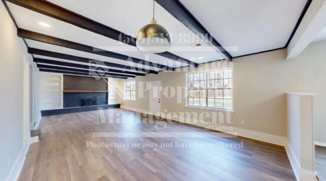 Building Photo - Showings Available!