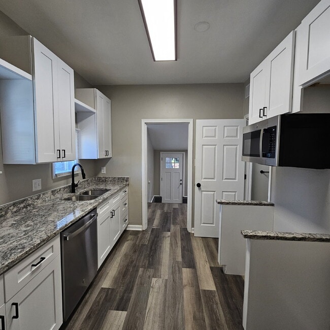 Building Photo - Fully Remodeled 2-Bedroom Duplex Near Lake St. Clair – Granite Kitchen & Spacious Layout