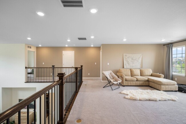 Building Photo - Luxury 4BD, 3.5BA Sterling Ranch Home with...
