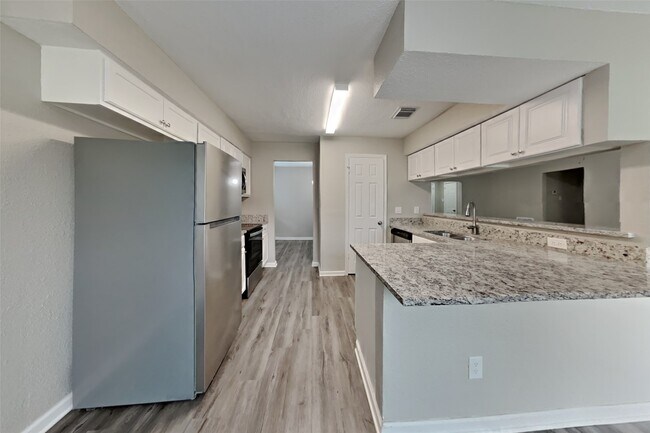 Building Photo - 10210 Rippling Fields Dr