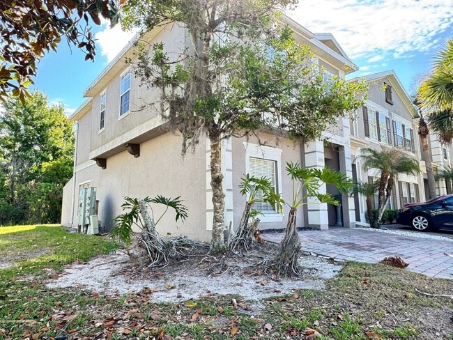 Building Photo - Fully Furnished 5-Bed End-Unit Townhome with Hot Tub in Gated Coral Cay! WASHER & DRYER INCLUDED!