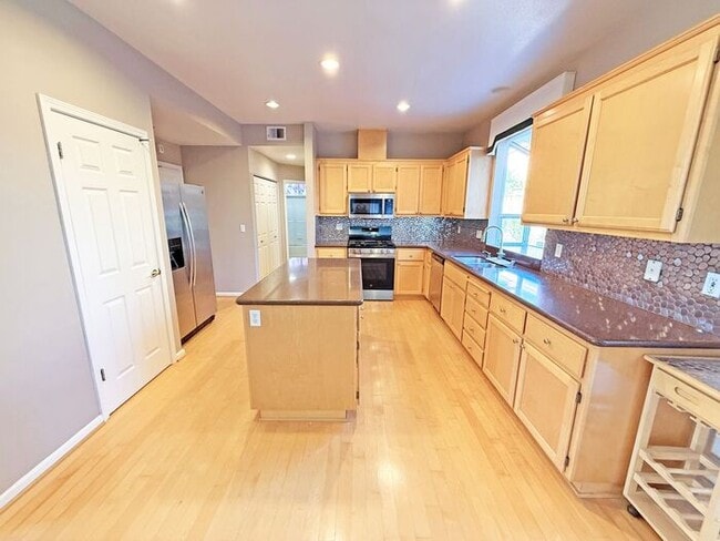 Building Photo - Beautiful Evergreen Home with Pool on Corner Lot -- Walk to Park and Chaboya Middle!