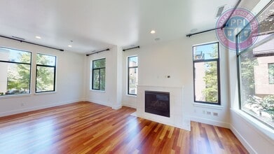 Building Photo - Riverfront Location, Luxury Townhome - End Corner Unit, Two En-Suites, Attached Garage