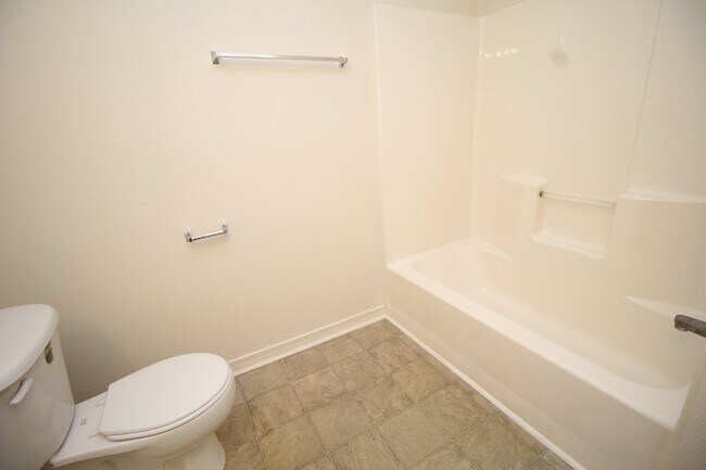 Building Photo - Pace 3BR Patio Home with Fenced Backyard & Open Floor Plan