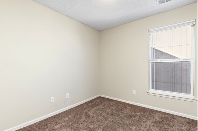 Building Photo - Spacious Two Bedroom Townhome - Available end of February