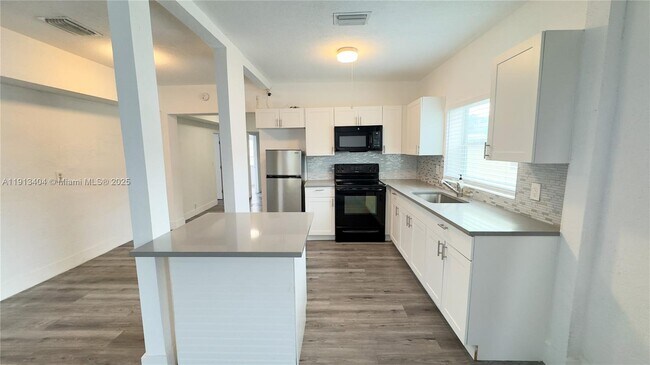 Building Photo - 1176 NW 48th St