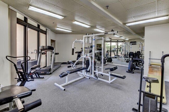 Building Photo - Furnished 3rd Floor Condo Overlooking The Golf Course