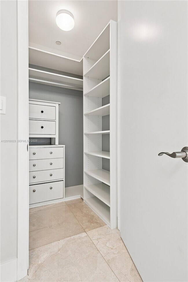Building Photo - 15811 Collins Ave