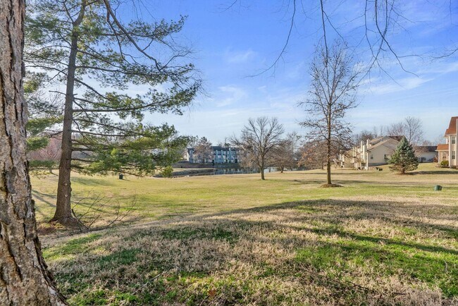Building Photo - COMING SOON - Spacious 2-Bed, 3.5-Bath Townhouse with Stunning Lake Views