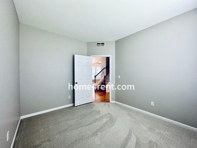 Building Photo - Wood Floors, Open Layout, Plenty of Natura...