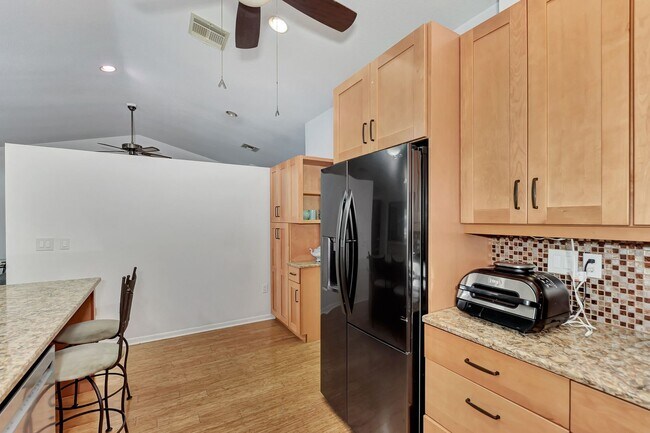 Building Photo - BEAUTIFUL 2 BEDROOM 2 BATHROOM + A DEN VILLA WITH GORGEOUS LAKE VIEWS!