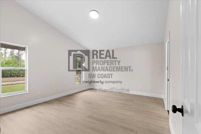 Building Photo - 3358 Sabal Springs Blvd