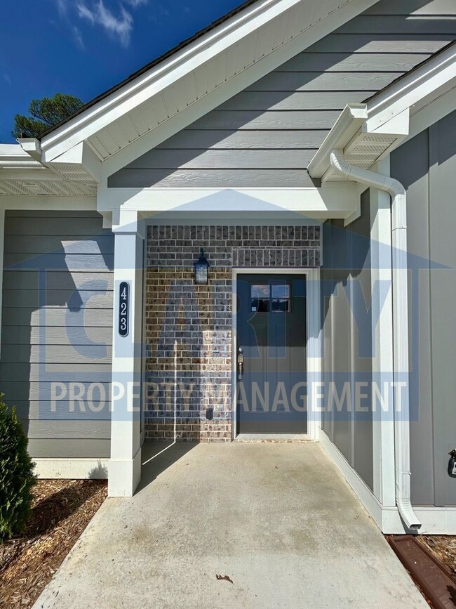 Building Photo - Newly constructed single level townhome!