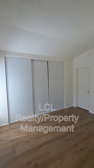 Building Photo - 12225 Pluto Dr