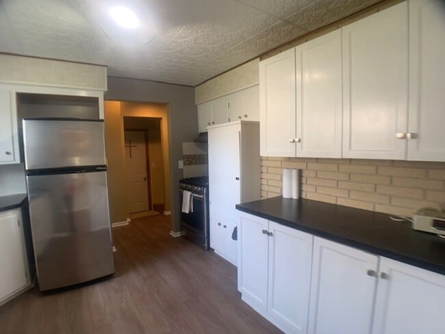 Building Photo - Huge yard! Updated appliances and more!