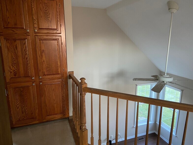 Linen closet and view from upstairs - 514 Heritage Dr