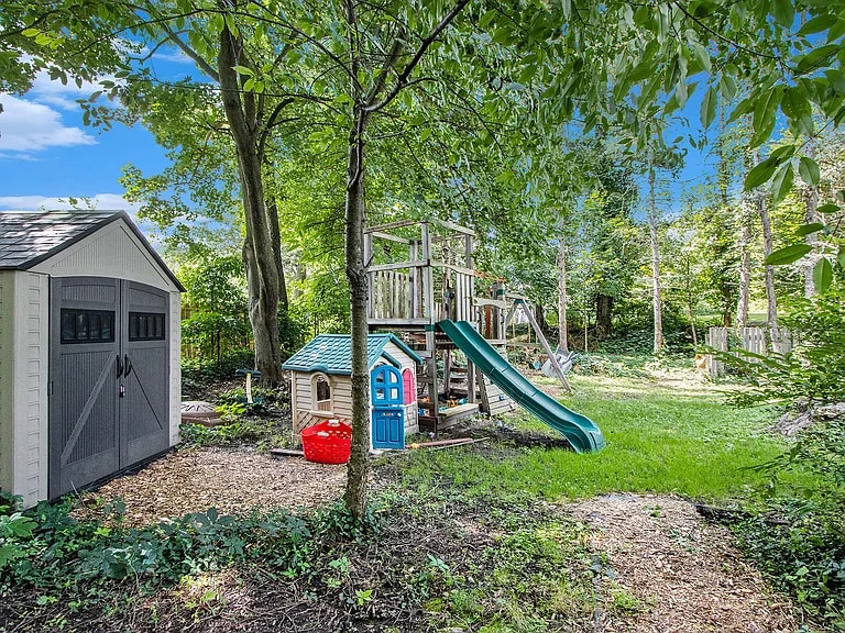 Backyard with playset and storage - 2909 Crestview Ave