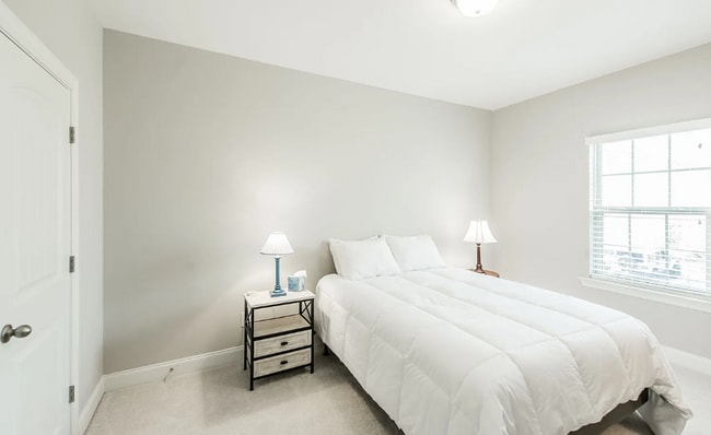 Building Photo - Upscale Modern Townhome nestled in the   G...