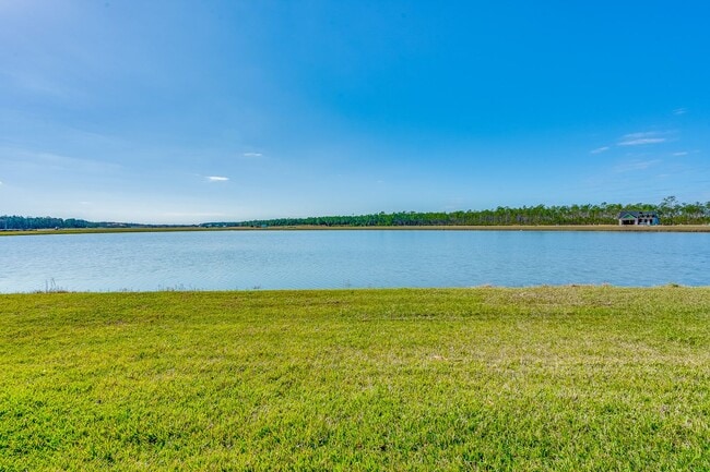 Building Photo - Luxurious Solar Powered 4 Bedroom, 3 Bath Waterfront Home with office & Upgrades Galore!