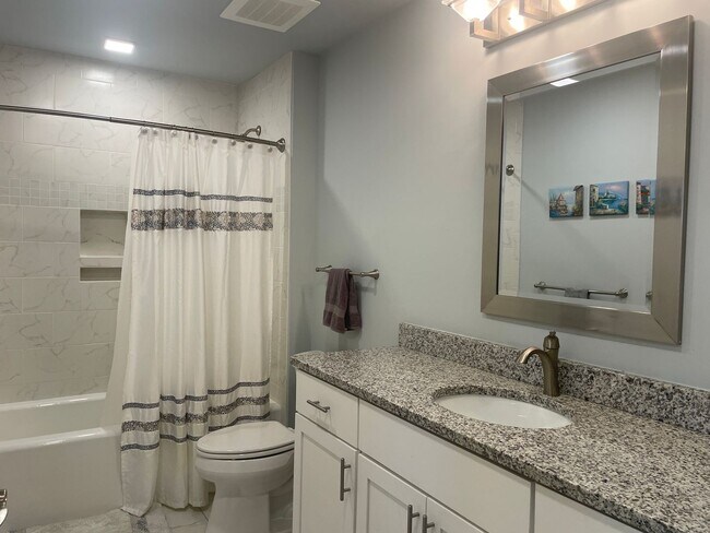 Building Photo - Coastal Luxury at Hidden Bay | 3BR Waterfront Condo with Bay Views