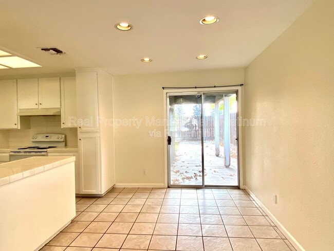 Building Photo - 5811 W Sample Ave