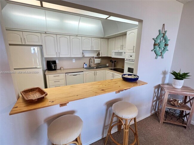 Building Photo - 19380 Collins Ave