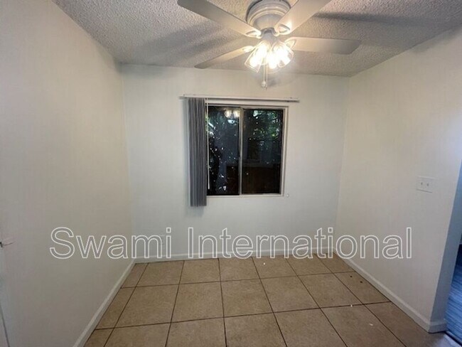 Building Photo - 1303 W 107th St