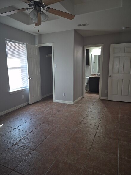 Master bedroom with master closet - 617 DFW Dr