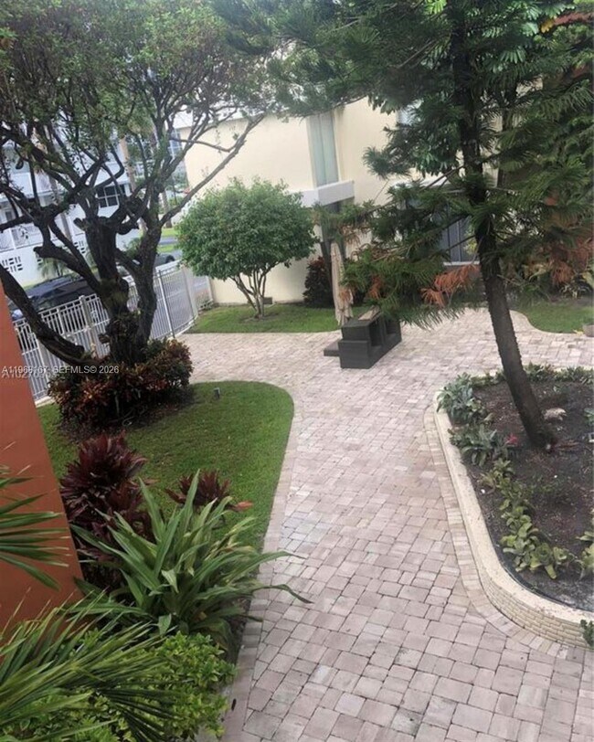 Building Photo - 10210 Collins Ave