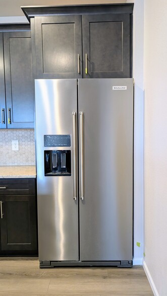 Refrigerator - with wine rack - 6569 N Malaya St