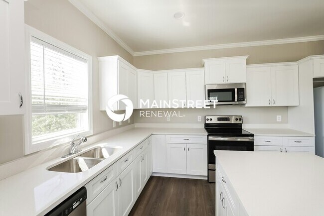 Building Photo - 4 Bedroom Pet-Friendly Home in North Port, FL with Main Street Renewal