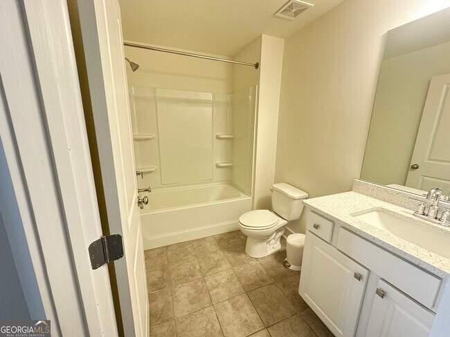 Building Photo - 62-62 Garrison Dr