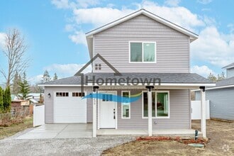 Building Photo - 3 Bedroom Home with 1.5 Bathrooms and an A...