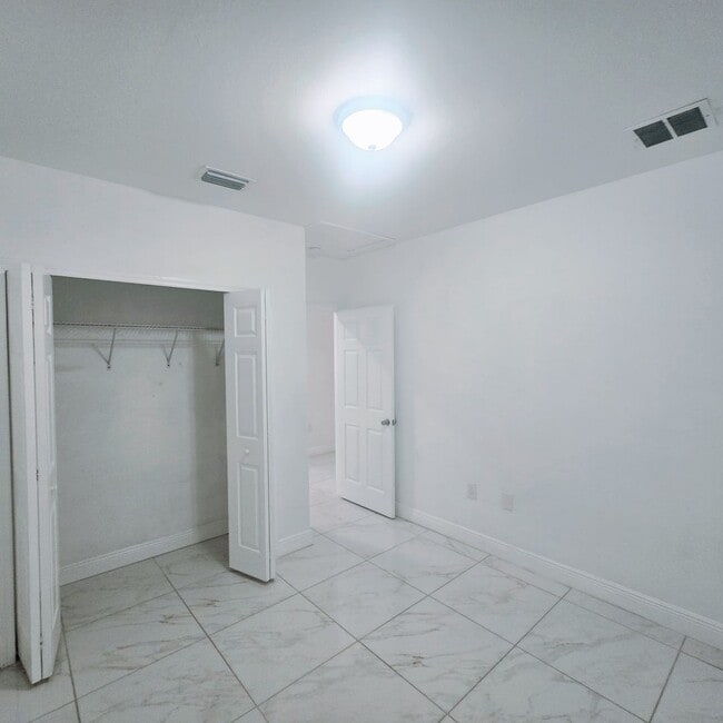 Building Photo - MUST SEE -2/2/1+OPEN DEN-DUPLEX IN GREENBR...